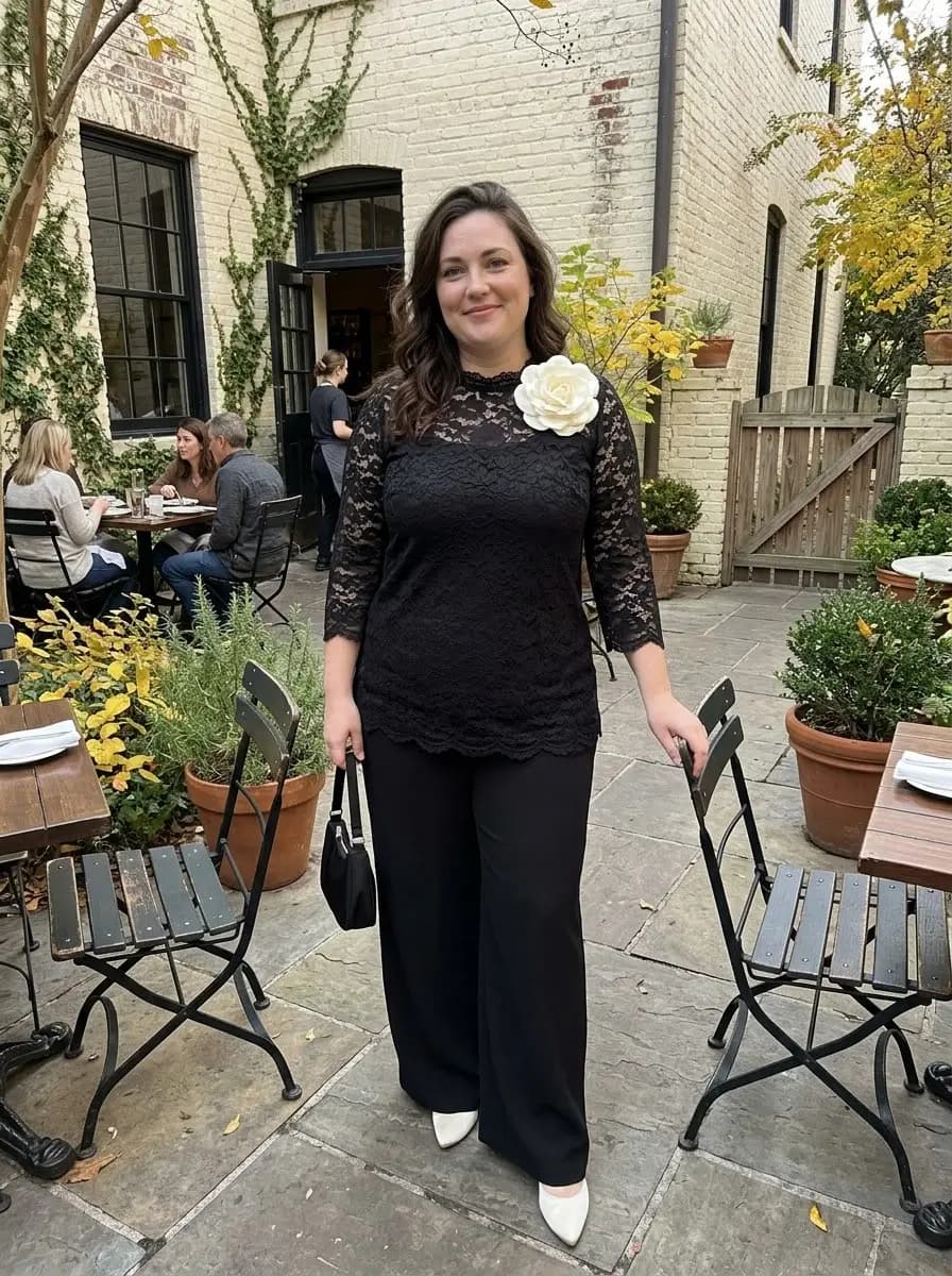 Black Lace Top with Black Wide-Leg Pants and White Floral Brooch