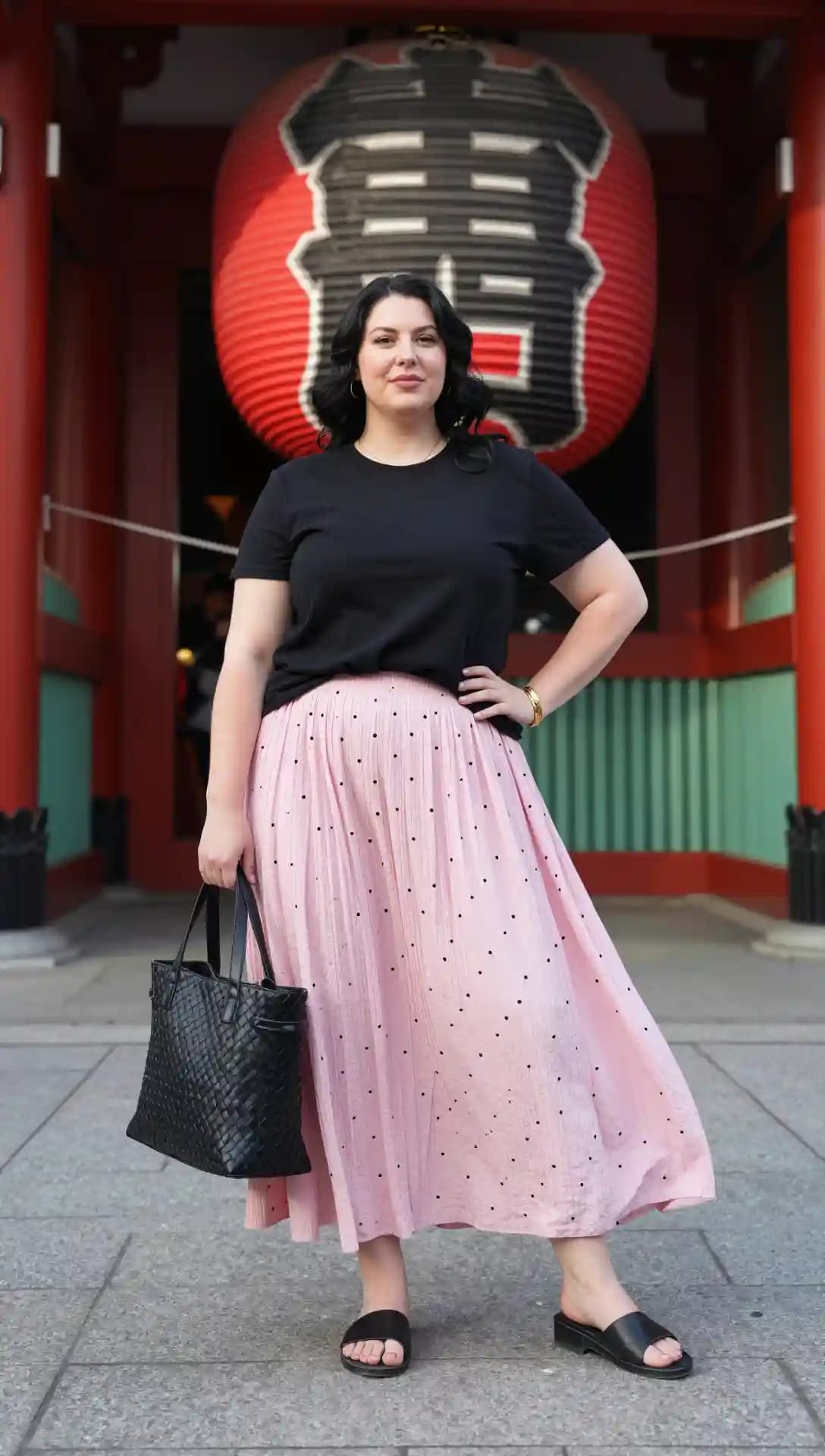 Black T-Shirt + Pink Polka Dot Midi Skirt + Black Sandals