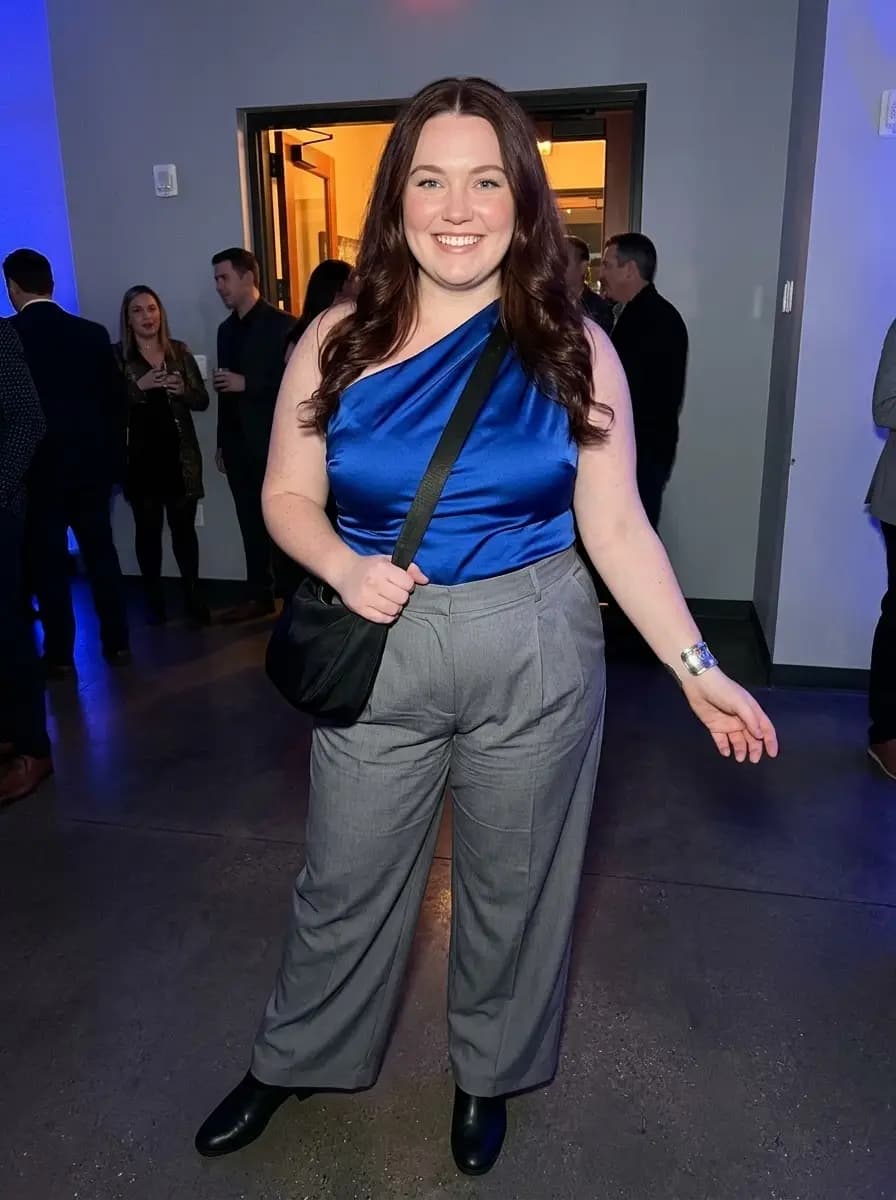 Cobalt-Blue One-Shoulder Satin Top with Gray Pleated Wide-Leg Trousers