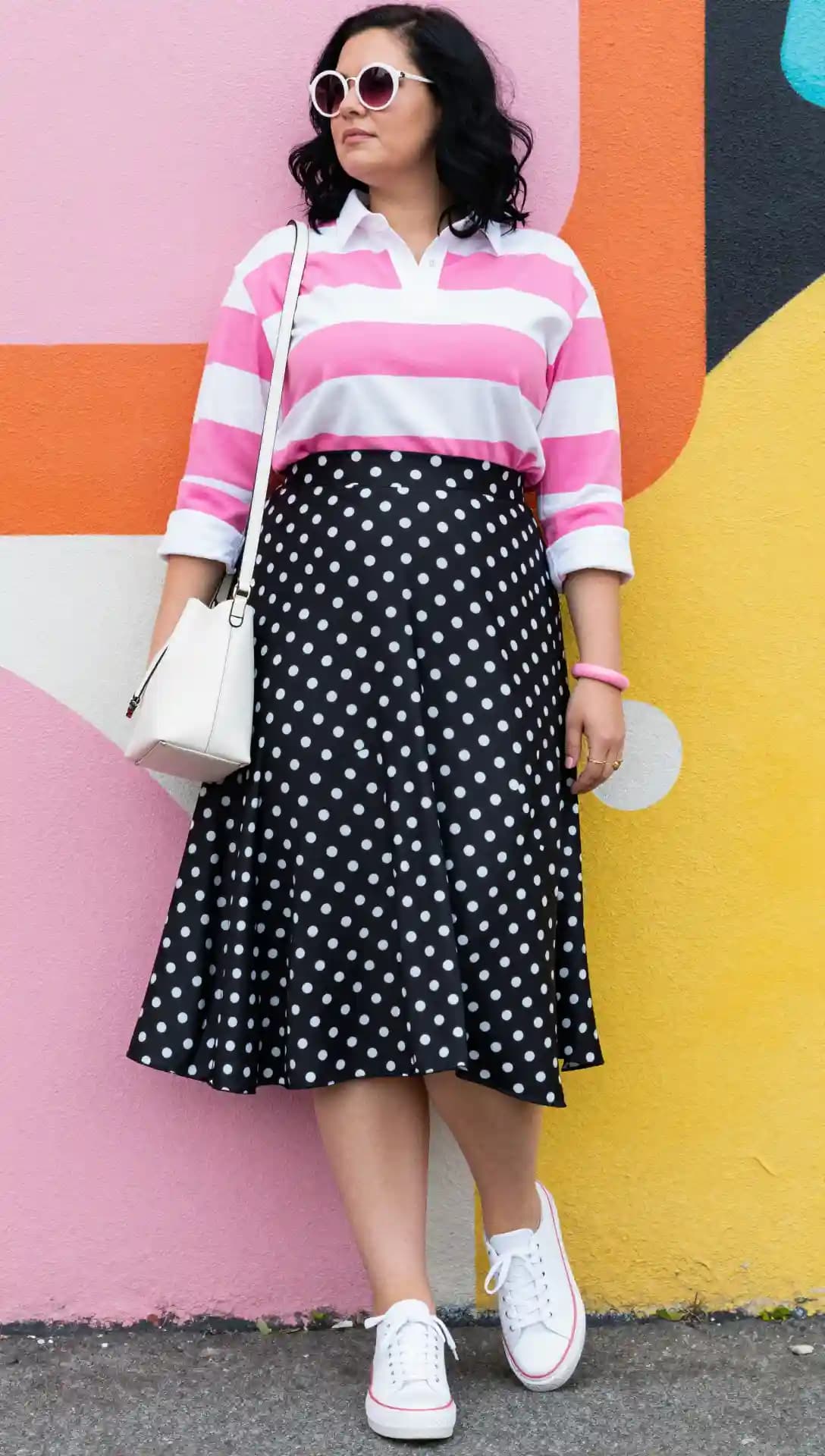 Pink and White Striped Rugby Top + Black Polka Dot Midi Skirt + White Sneakers