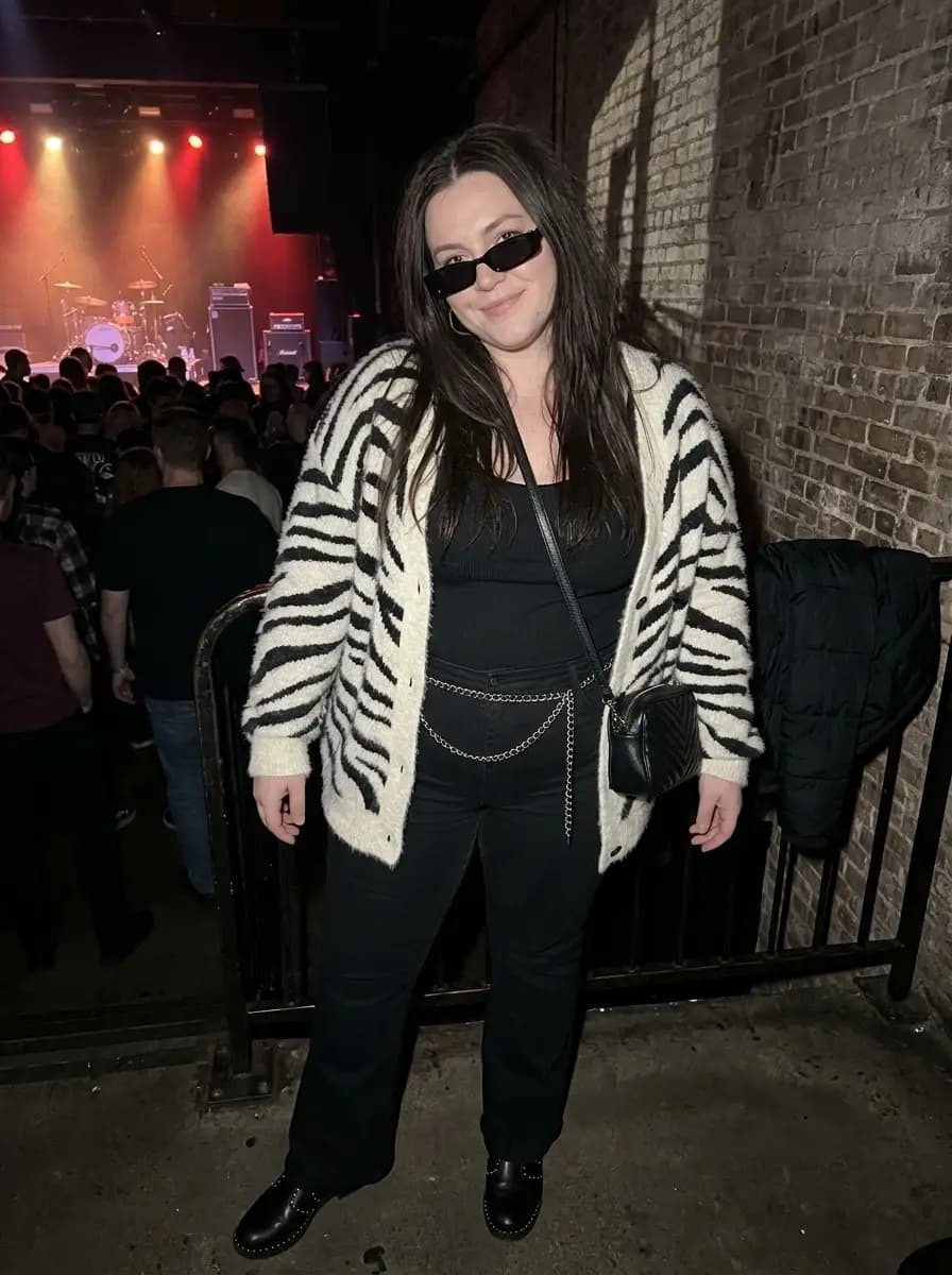Zebra-Print Cardigan with Black Tank Top and Flared Jeans