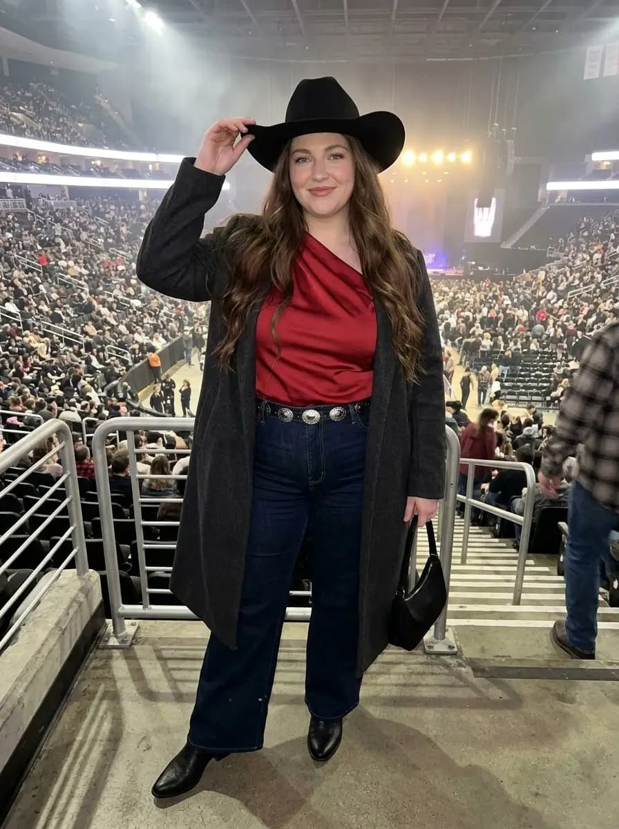 Red Satin One-Shoulder Top with Dark-Wash Jeans and Charcoal Coat