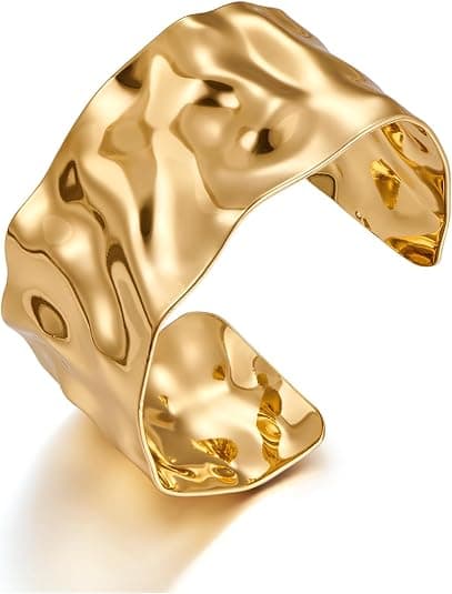 Wide gold cuff-style bangle bracelet